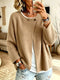 Ribstrikket vest med asymmetrisk snit