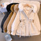 Women's winter utility jacket with a faux-fur hood and drawstring waist
