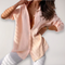 Women's shirt with button placket and rolled-up sleeves