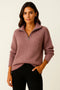 Ribbed knit sweater with high collar and zipper