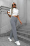 High-waisted women's pants, buttoned and stretchy
