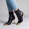 Bottines à talons hauts avec bout doré